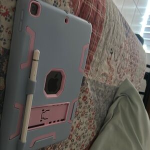 Apple iPad with Gray and Pink Protective Case